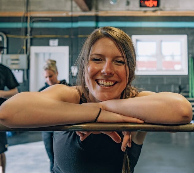 Lady smiling in the gym